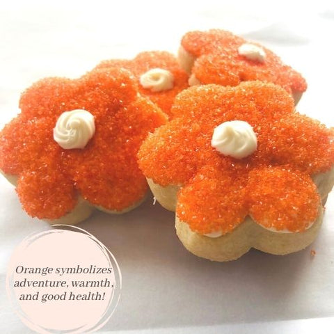 orange flower shaped sugar cookies. natural ingredients. Personalize for special events.