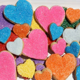Rainbow heart shaped cookies. Swirled with white chocolate and rainbow sprinkles. Super Love cookies