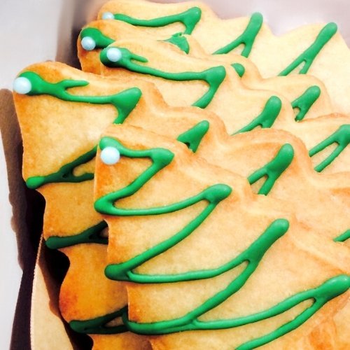 Christmas tree decorated sugar cookies gift wrapped