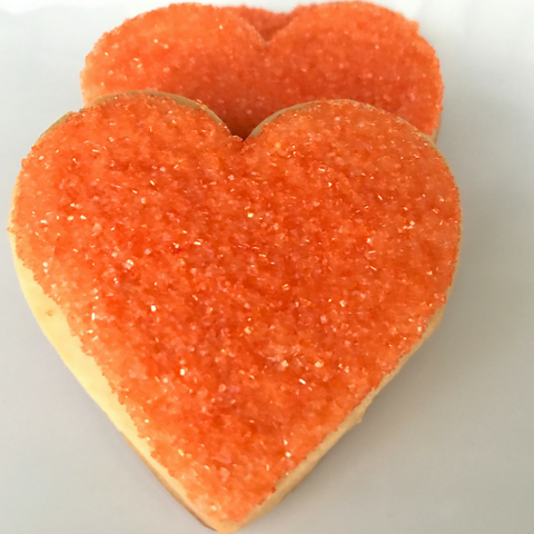 Orange heart shaped sugar cookie