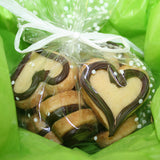heart shaped sugar cookies with dark chocolate and gift wrapped